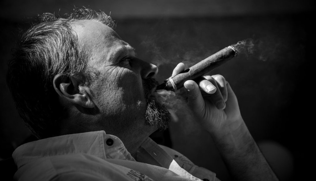 man having cigar